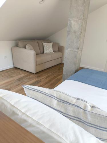 Katil atau katil-katil dalam bilik di Lembranza Guest House