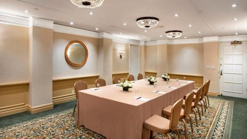 a conference room with a long table and chairs at Willard InterContinental Washington by IHG in Washington