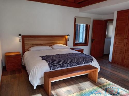 Postel nebo postele na pokoji v ubytování Claro de Luna Lodge