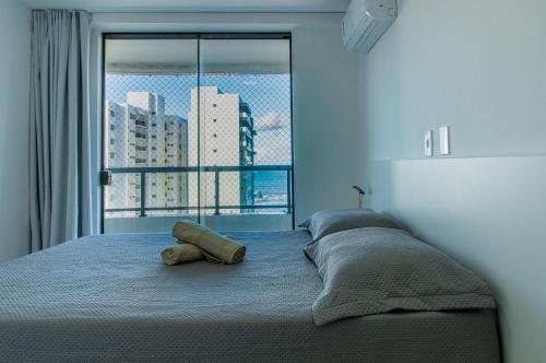 Postel nebo postele na pokoji v ubytování Apê com Vista Mar na Praia do Sul!