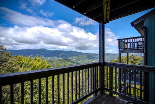 a view from the balcony of a cabin with a view at The Highlands at Sugar in Banner Elk