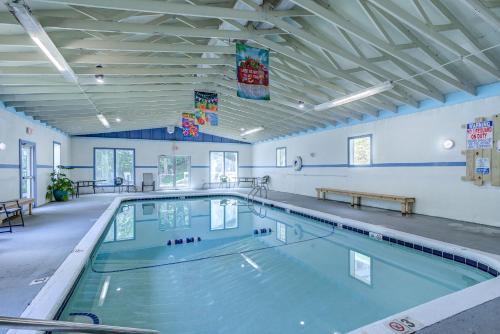a swimming pool in a large room at The Highlands at Sugar in Banner Elk