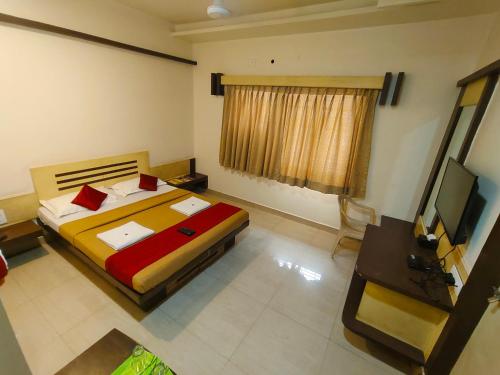 Una cama o camas en una habitación de Hotel Sai ba