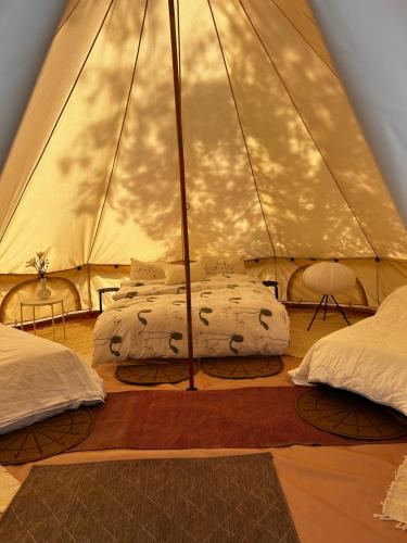 Ένα ή περισσότερα κρεβάτια σε δωμάτιο στο Ulvsby Ranch Glamping
