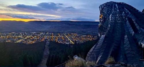 a view of a city from the top of a mountain at Habitacion Privada en Casa de Ale in San Martín de los Andes