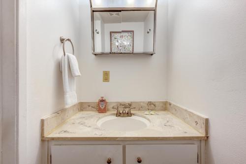 a bathroom with a sink and a mirror at Blue Lake Bliss in Tahoe City