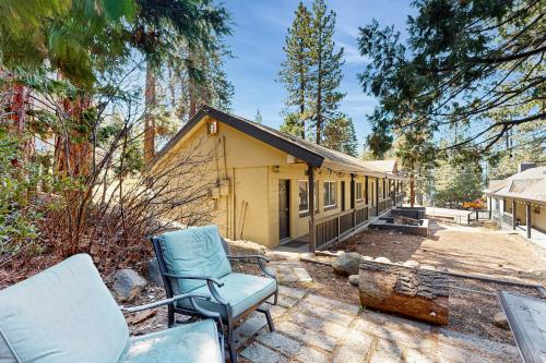 a house with two chairs sitting on a patio at The Chalet at Kings Beach Unit 4 in Kings Beach
