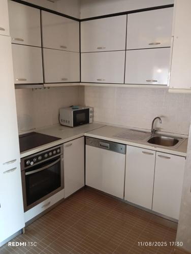 Dapur atau dapur kecil di Bus Station B&B Flat