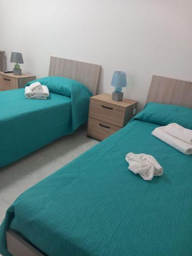 Una cama o camas en una habitación de Casa Vacanze del Salento