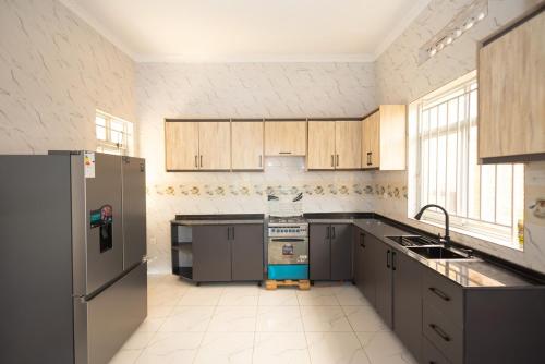 Kuchyň nebo kuchyňský kout v ubytování Inganzo Hause