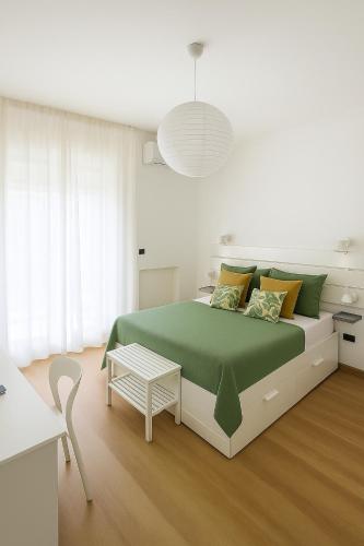 Ένα ή περισσότερα κρεβάτια σε δωμάτιο στο A casa di Paolina