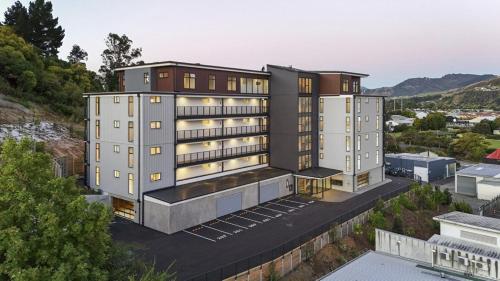an overhead view of a building with buildings at City haven away from home in Nelson