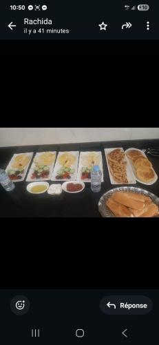 a page of a website with a display of food at Chambres au sein d'une villa in Rabat