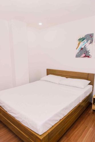 Postel nebo postele na pokoji v ubytování Balai Malipayon