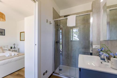 a bathroom with a shower and a sink at Italian Experience- Poggio Padule in San Venanzo