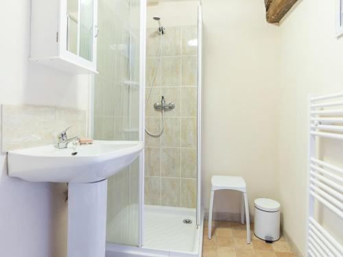 a bathroom with a sink and a shower at Normandy Countryside Stay in Montaigu-les-Bois