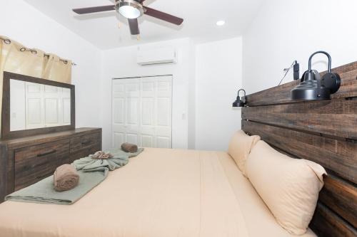 Katil atau katil-katil dalam bilik di Snowbird Family Friendly Ready Stay in West End