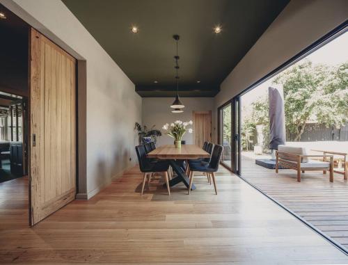 a dining room with a table and chairs at Family Luxury In Lake Wendouree in Wendouree