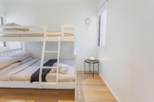 Ένα ή περισσότερα κρεβάτια σε δωμάτιο στο Parker Retreat