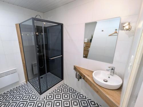 a bathroom with a sink and a shower at Grand gîte de caractère pour 15 pers à Aillevillers avec jardin - FR-1-583-478 in Aillevillers-et-Lyaumont