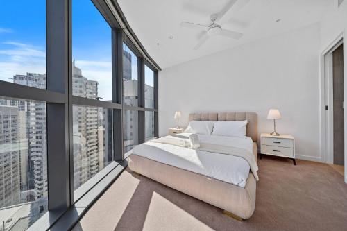 Ένα ή περισσότερα κρεβάτια σε δωμάτιο στο Crème de la Crème -Sweet Stay on BNE Casino w Car