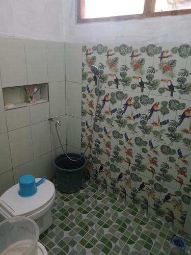 Ένα μπάνιο στο Homestay Elok Arka