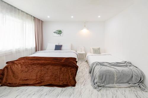 Ліжко або ліжка в номері Split Level House in Hongdae