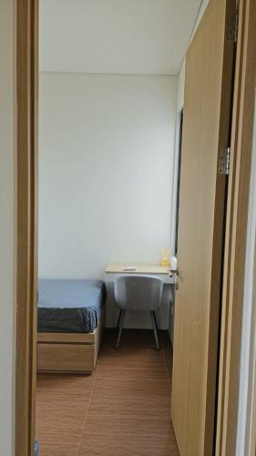 Postel nebo postele na pokoji v ubytování Seffa living bsd Jakarta