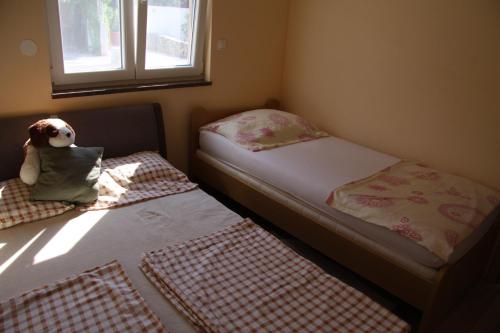 Posteľ alebo postele v izbe v ubytovaní Apartment Pal