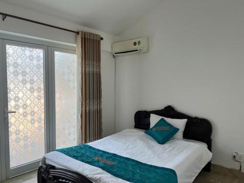 Ένα ή περισσότερα κρεβάτια σε δωμάτιο στο Xsunshine apartment