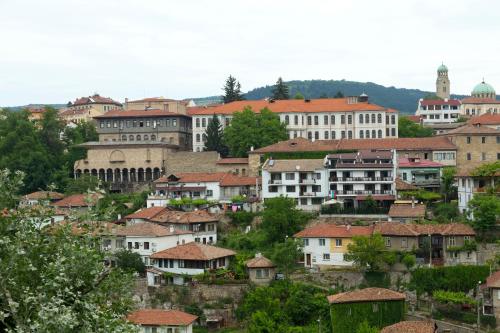 a group of houses on a hill with buildings at Hotel Terazini in Veliko Tŭrnovo