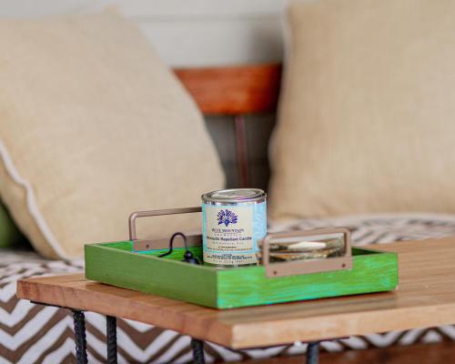 a green box on a table with a can on it at Adella's Blue Mountain Coffee Farmstay in Kingston