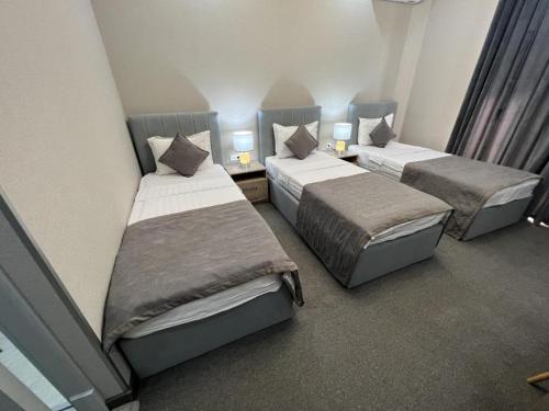 Katil atau katil-katil dalam bilik di Mini--Hotel Tashkent