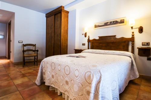 Кровать или кровати в номере Hotel Doña Manuela