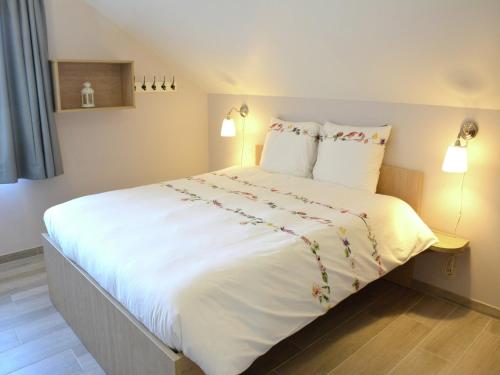 Un ou plusieurs lits dans un hébergement de l'établissement Home in Ovifat with Sauna