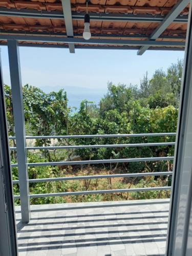 a view from the balcony of a house at Villa Kostandin in Piqeras