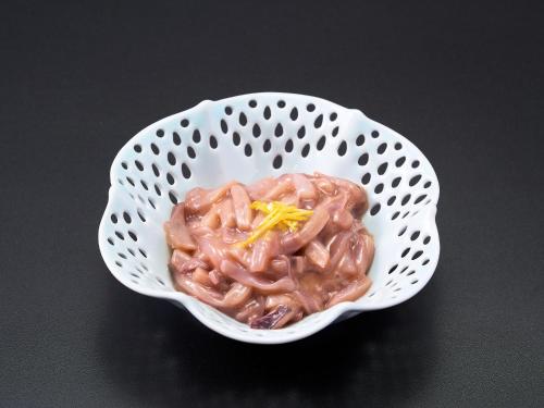 a white bowl of food with a piece of food in it at APA Hotel Sendai Eki Itsutsubashi in Sendai
