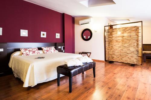 Кровать или кровати в номере Hotel Doña Manuela