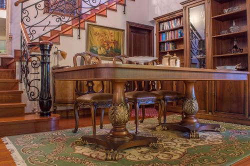 a dining room with a table and chairs at Luxury Villa Karteros in Karteros