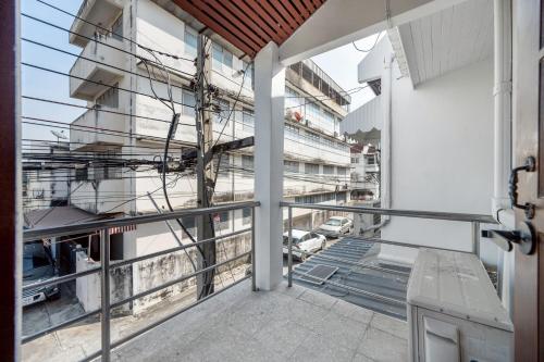 a view from the balcony of a building at MIQ HK611 Huai Khwang 4BR Jodd fair in Bangkok
