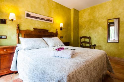 Кровать или кровати в номере Hotel Doña Manuela