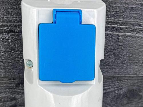 a plastic holder with a blue square on it at 14 person holiday home in Vejby in Vejby