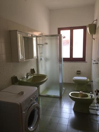 Een badkamer bij Bithia Apartment