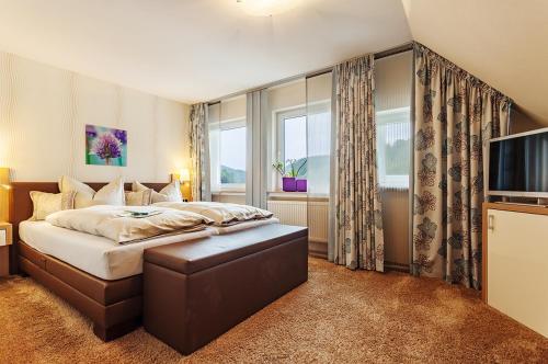 Postel nebo postele na pokoji v ubytování WILLINO Privathotel