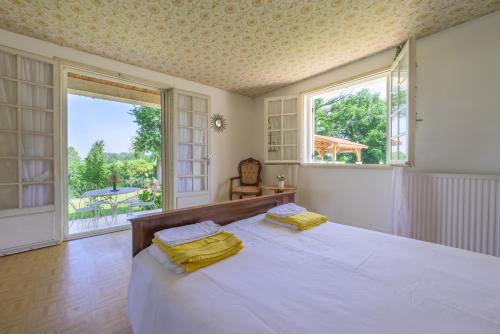 Ένα ή περισσότερα κρεβάτια σε δωμάτιο στο Mon rêve villa