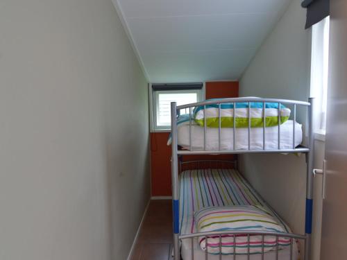 Farmhouse in Fochteloo near National Parkにあるベッド