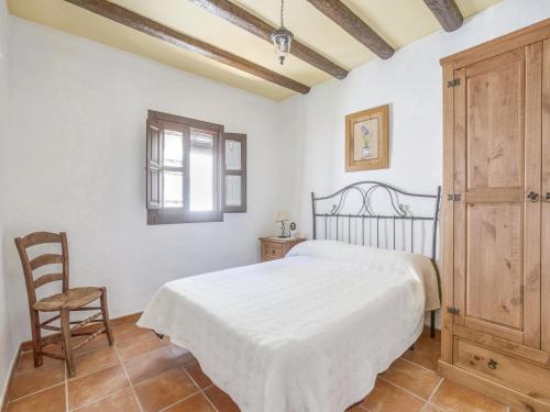 Ένα ή περισσότερα κρεβάτια σε δωμάτιο στο Villa in Carcabuey near Sierras Subbeticas Park