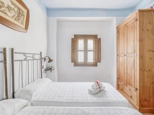 Ένα ή περισσότερα κρεβάτια σε δωμάτιο στο Villa in Carcabuey near Sierras Subbeticas Park