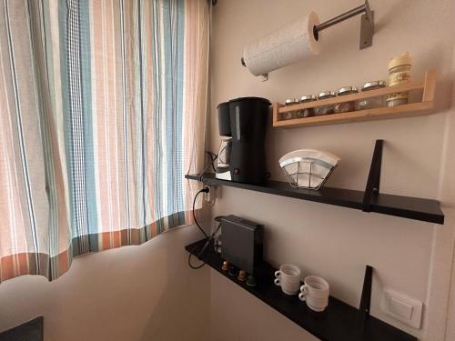 Kuchyň nebo kuchyňský kout v ubytování Studio Vue Mer à Luc-sur-Mer
