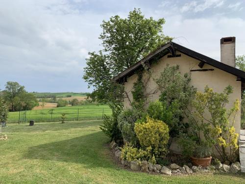 a building with plants on the side of it at Cozy French Escape in Monfort in Monfort